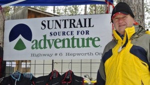 Suntrail Source for Adventure, Hepworth, Ontario - man standing next to outdoor clothing display