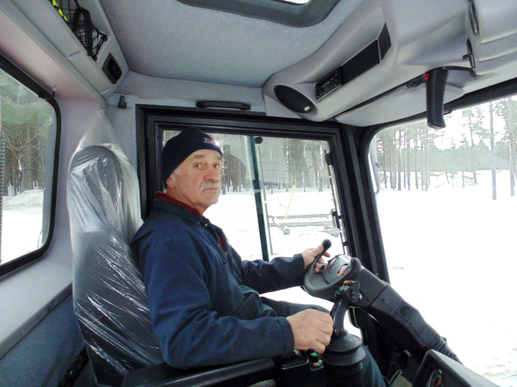 Sawmill Nordic Centre - Fred in cab of PistenBully groomer