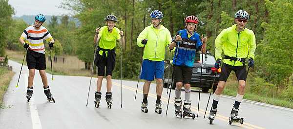 Cross-country skiers practicing on roller skis