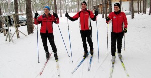 Three Cross-Country Skiers in Red - Volunteers with Bruce Ski Club in Ontario